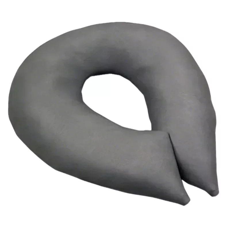 Cojín facial abierto relleno de fibra ultraligera para apoyo cómodo del rostro en masajes de clínicas de fisioterapia.